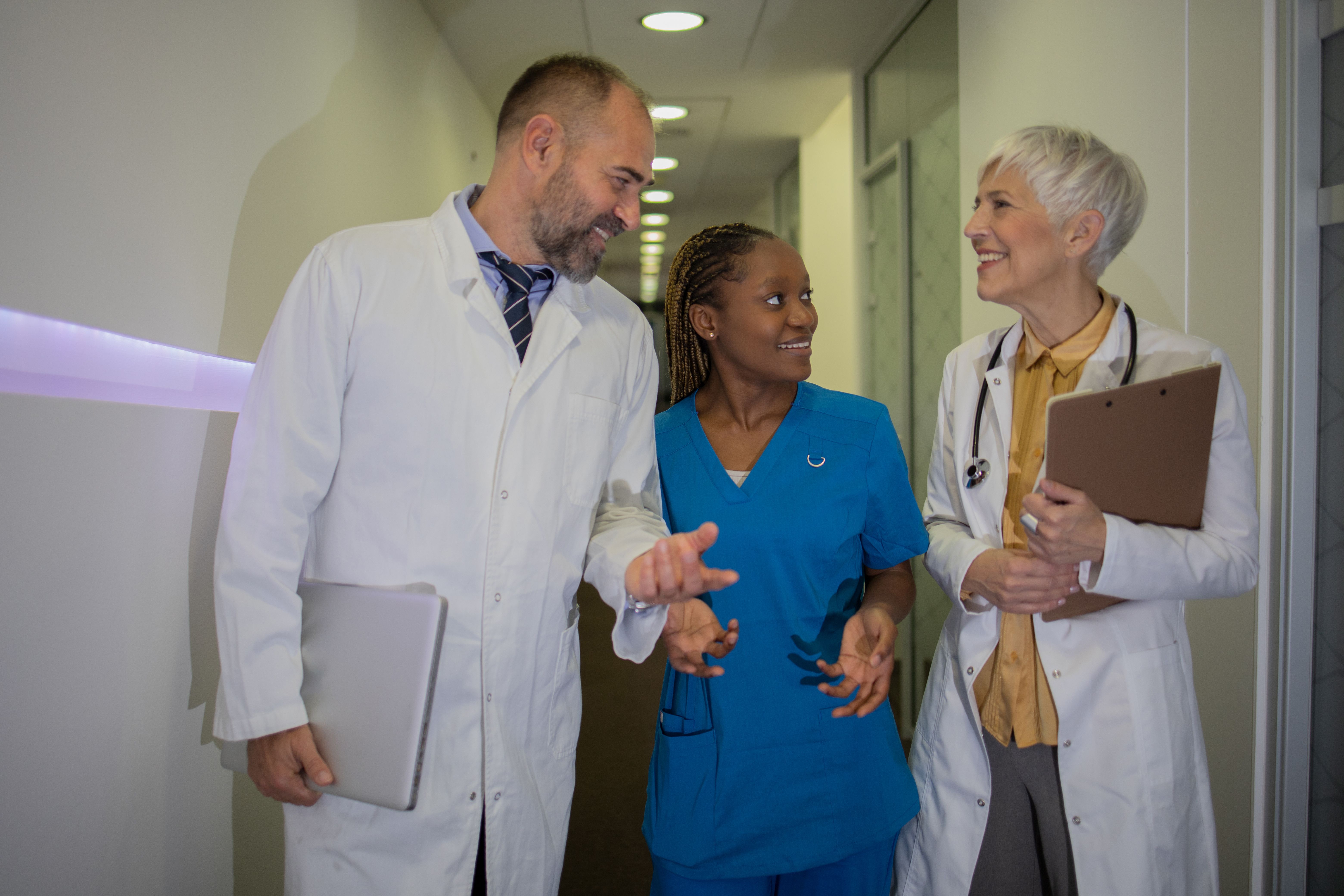 Doctor and nurse discussing patient case